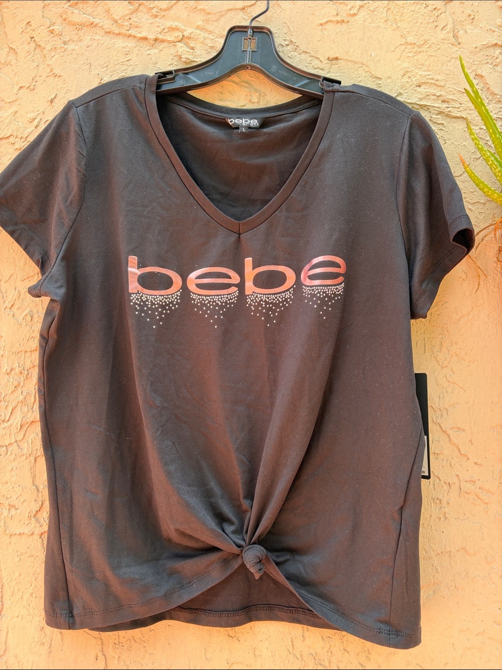 bebe Black V-Neck Tee with Pink Logo, Gold Dots and Front Knot Detail